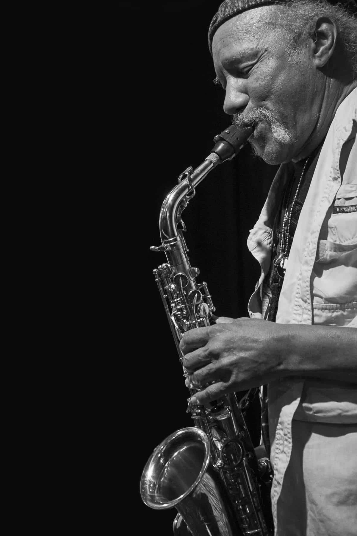 Charles Neville playing the saxophone