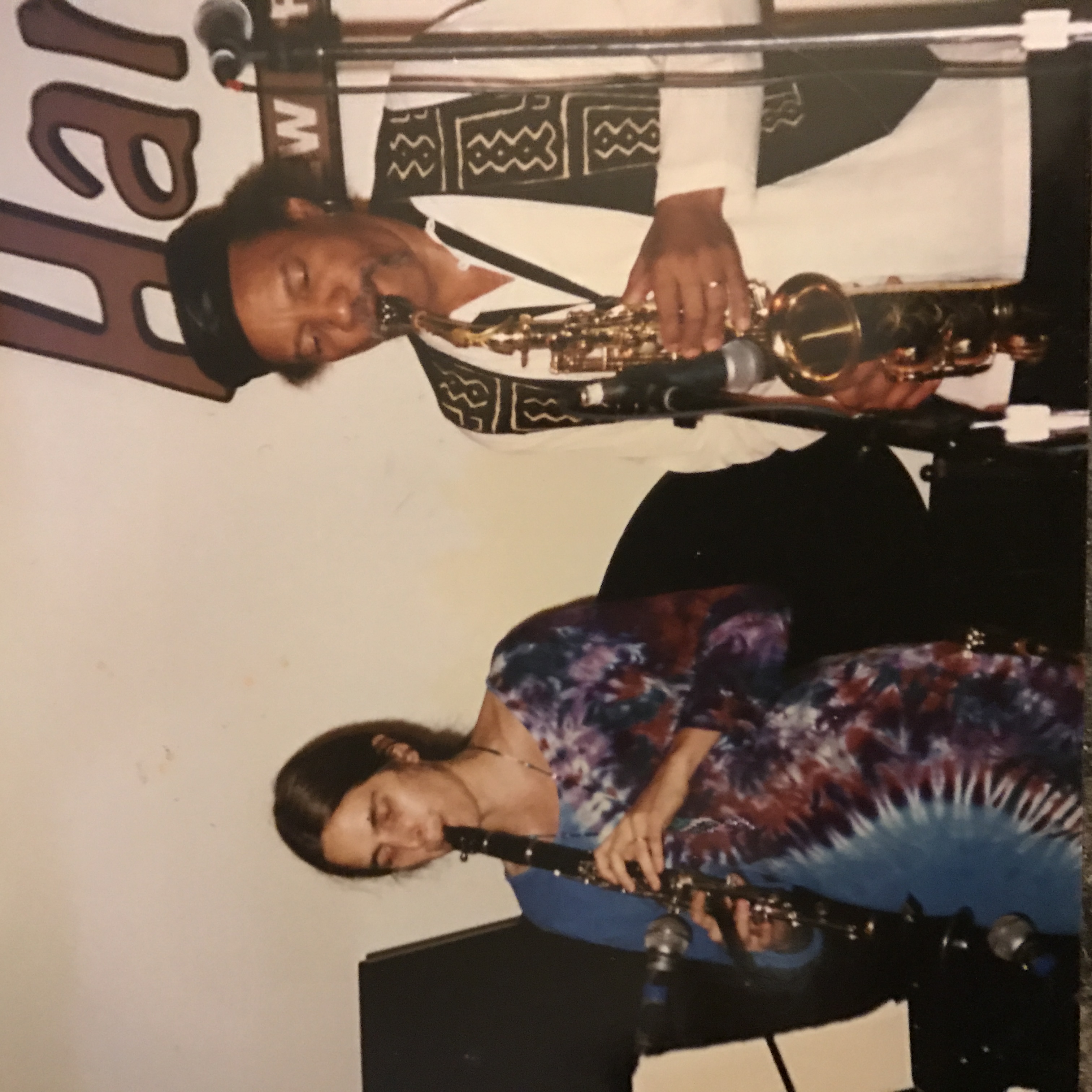 Kristin Neville playing clarinet alongside Charles Neville on saxophone